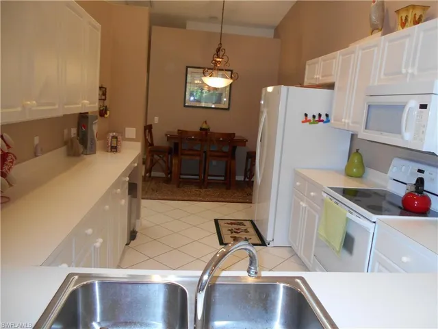 a storage & utility room with a sink