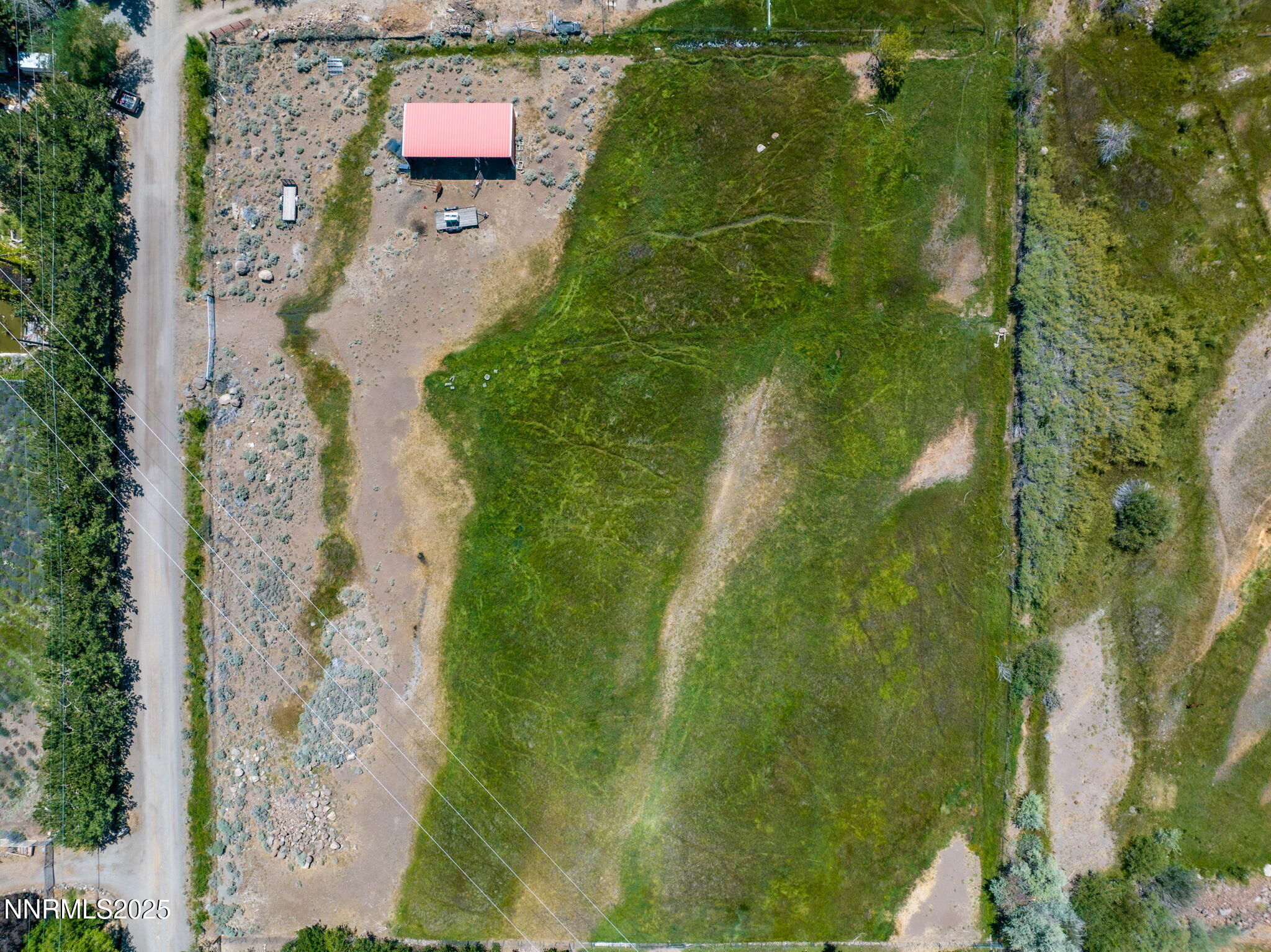 11355 Maverick Lane Reno, NV 89511 - Photo 12 of 14 an aerial view of residential house with pool and trees all around