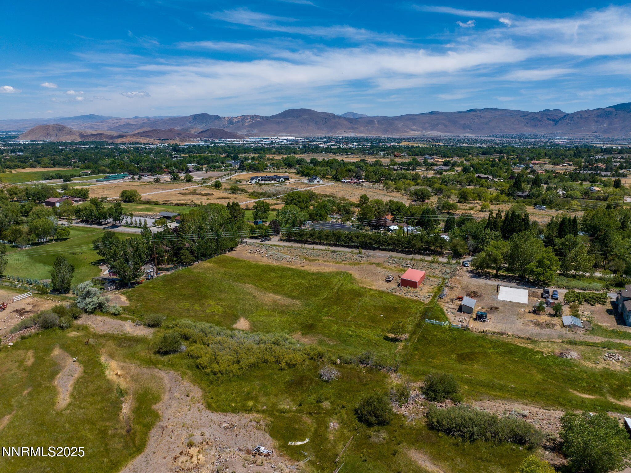 11355 Maverick Lane Reno, NV 89511 - Photo 2 of 14 a view of a lake with a mountain
