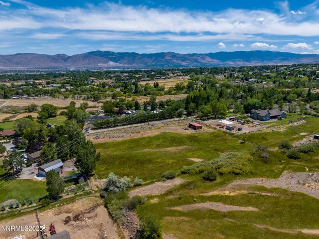 a view of a city with mountains in the background