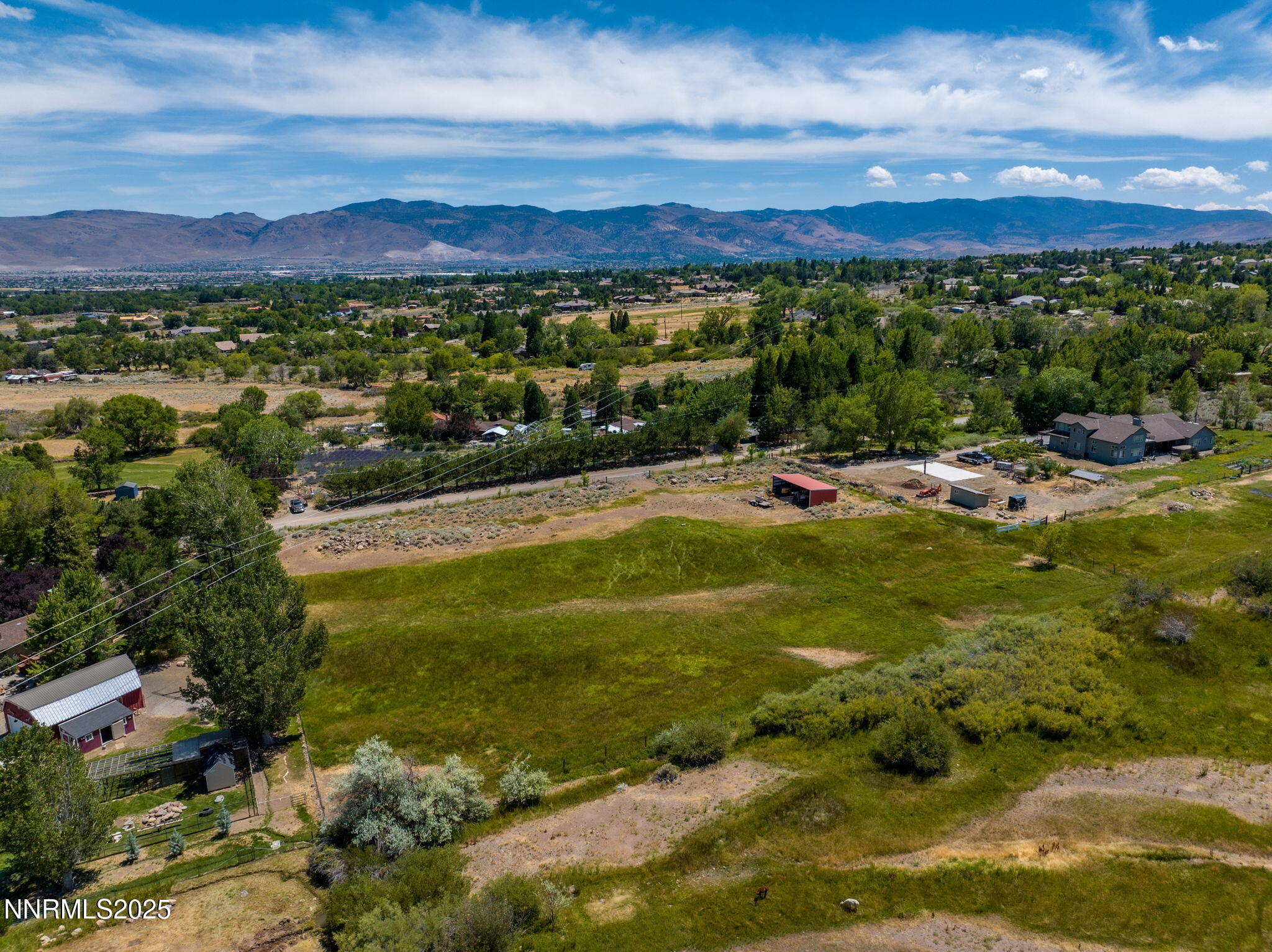 11355 Maverick Lane Reno, NV 89511 - Photo 4 of 14 a view of a city with mountains in the background