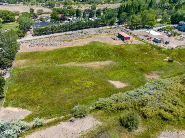 a view of a swimming pool with an outdoor space and seating area