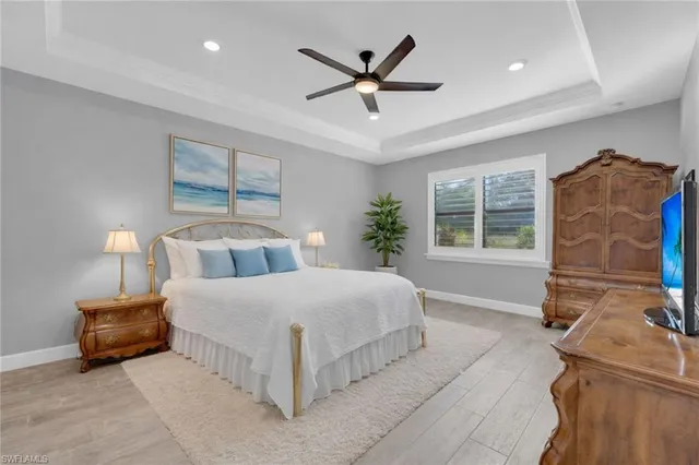 a bedroom with bed and window