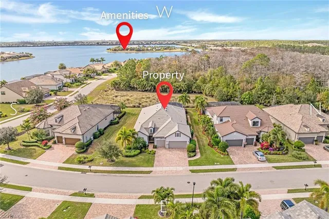 an aerial view of houses with outdoor space
