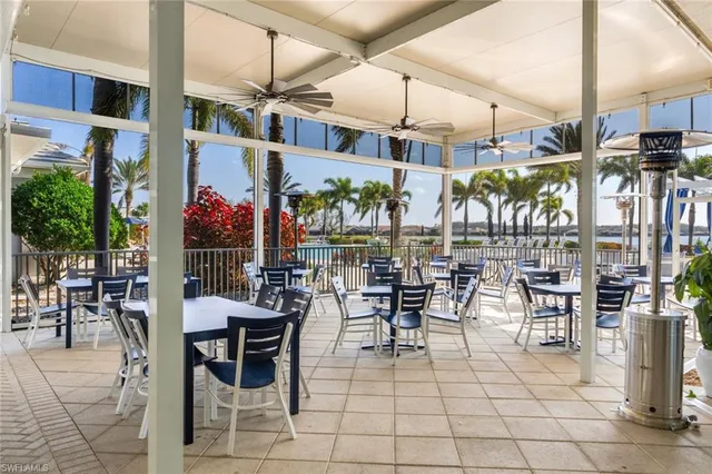 a outdoor space with lots of tables and chairs
