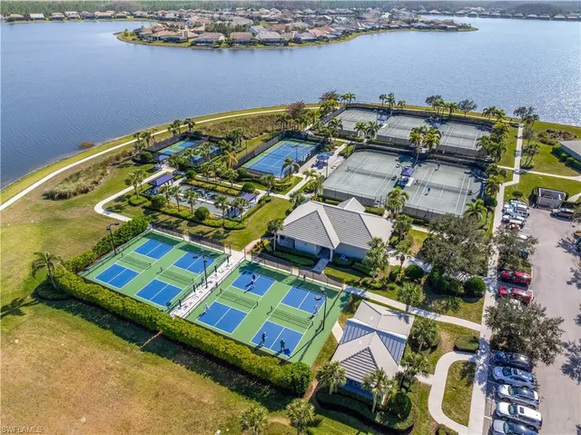 an aerial view of a house with a ocean view
