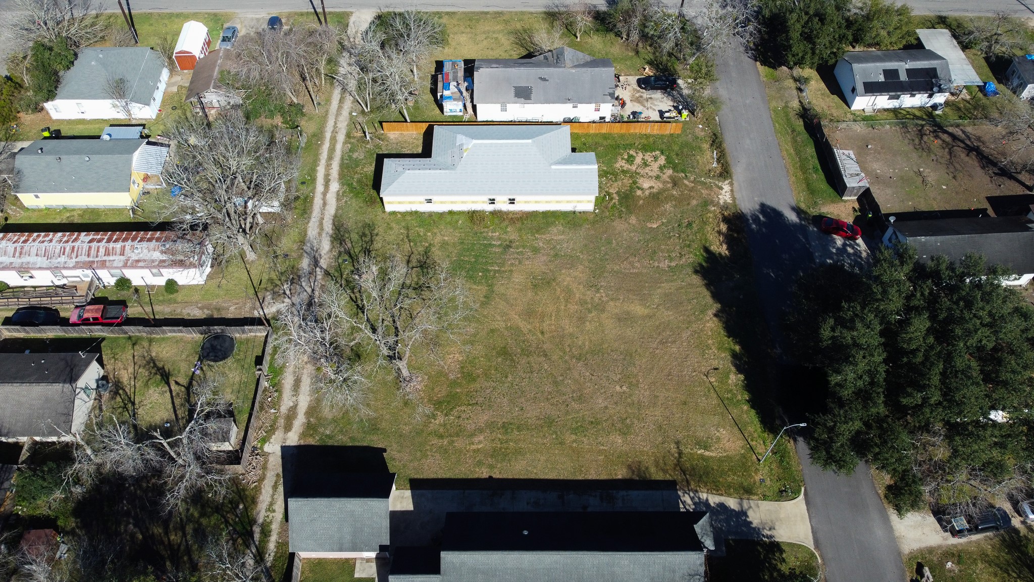 0 Brazos Street Rosenberg, TX 77471 - Photo 3 of 12 an aerial view of residential houses with outdoor space