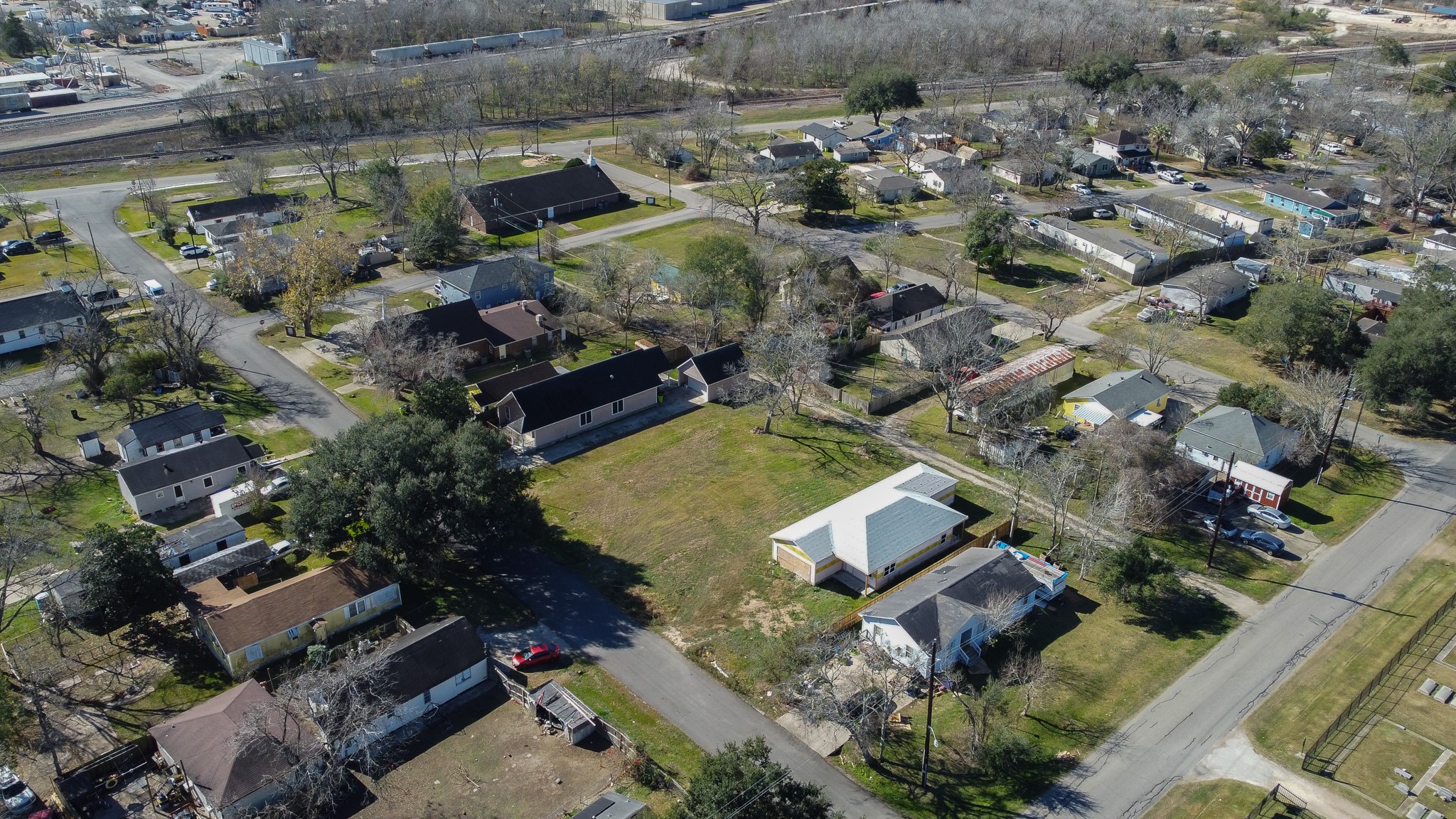 0 Brazos Street Rosenberg, TX 77471 - Photo 5 of 12 an aerial view of multiple houses with yard