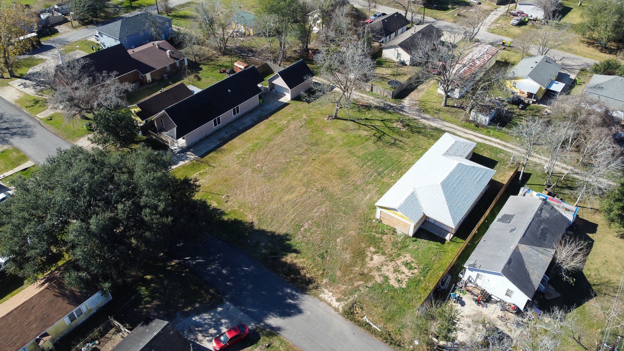 0 Brazos Street Rosenberg, TX 77471 - Photo 6 of 12 an aerial view of a house a yard and swimming pool