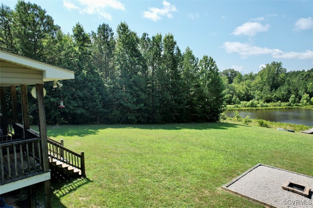 4554 Plank Road Kenbridge, VA 23944 - Photo 16 of 41 a view of a patio with a table & chairs
