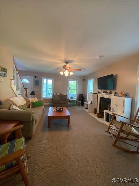 4554 Plank Road Kenbridge, VA 23944 - Photo 22 of 41 a living room with furniture a flat screen tv and a fireplace