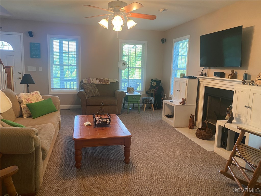 4554 Plank Road Kenbridge, VA 23944 - Photo 23 of 41 a living room with furniture a flat screen tv and a window