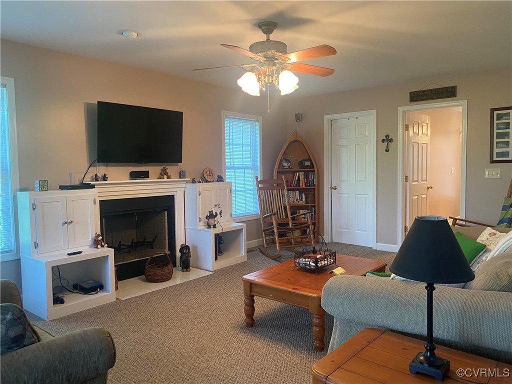 4554 Plank Road Kenbridge, VA 23944 - Photo 24 of 41 a living room with furniture and a flat screen tv
