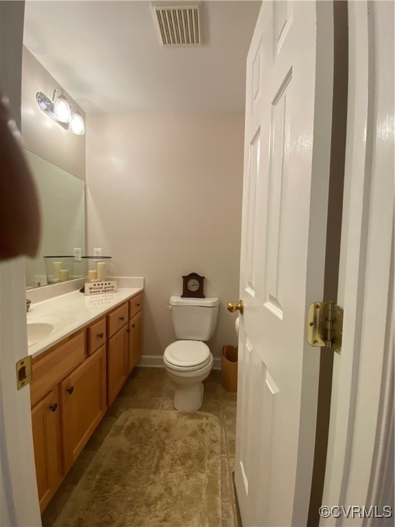 4554 Plank Road Kenbridge, VA 23944 - Photo 27 of 41 a bathroom with a toilet sink and mirror