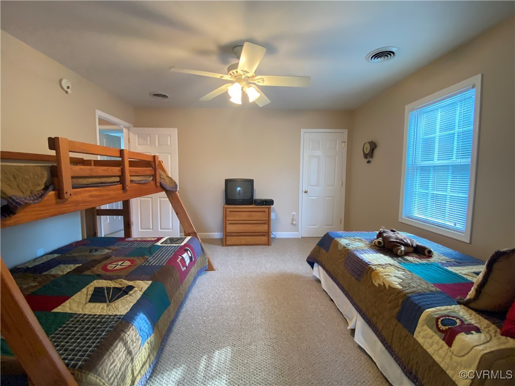 4554 Plank Road Kenbridge, VA 23944 - Photo 36 of 41 a bedroom with bed and a window
