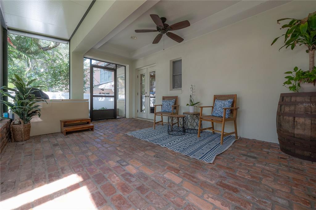 3108 West Villa Rosa Street Tampa, FL 33611 - Photo 47 of 58 a living room with furniture and a potted plant