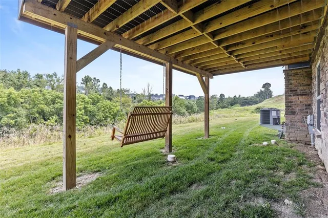 a view of porch with a backyard