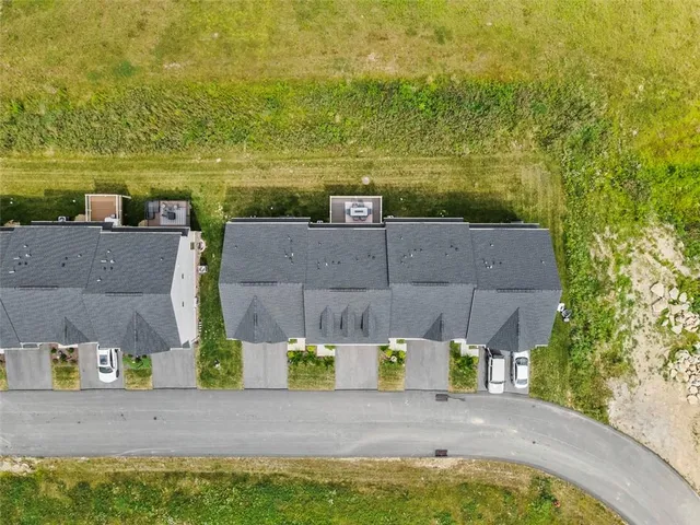 a view of a yard with a swimming pool