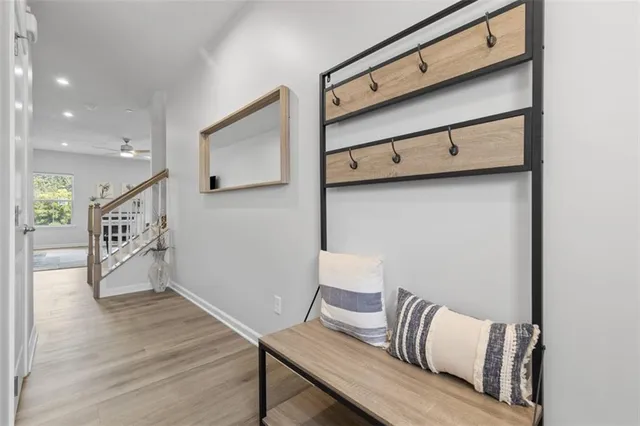 a bathroom with a sink a mirror and a shower