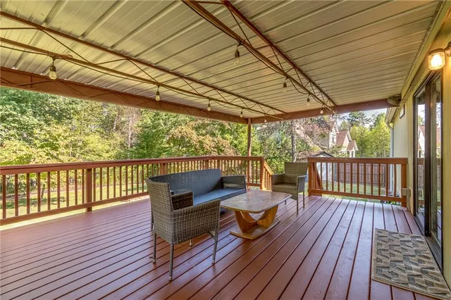 a view of roof deck with wooden floor