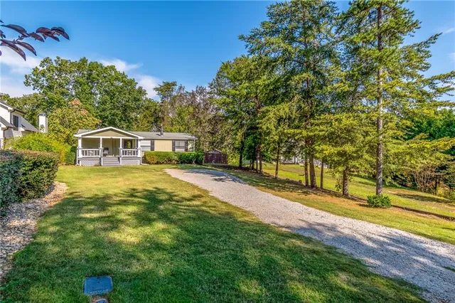 a house view with a outdoor space
