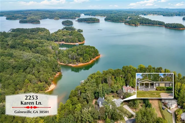 a view of a lake with a building in the background