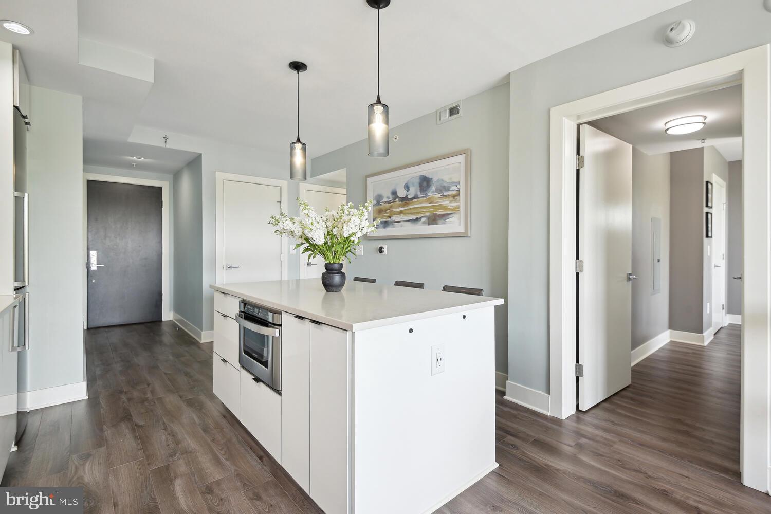 1311 13th Street Northwest, Unit 505 Washington, DC 20005 - Photo 12 of 43 Island with built-in microwave
