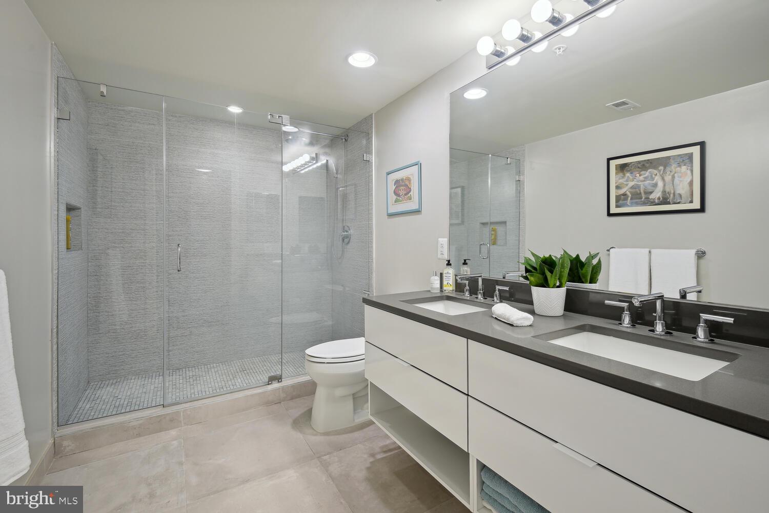 1311 13th Street Northwest, Unit 505 Washington, DC 20005 - Photo 19 of 43 Primary ensuite bath with double vanities