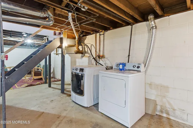 a view of a room with wooden ceiling