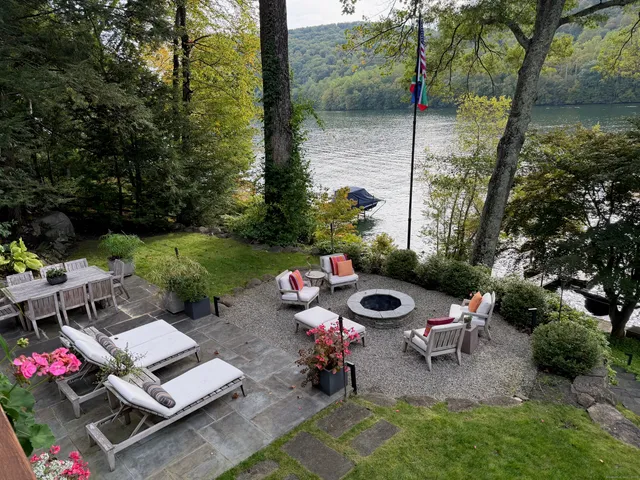 a view of a table and chairs in the garden