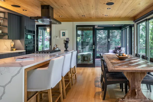 a view of a dining room with furniture window and outside view