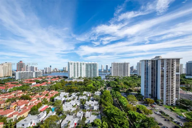 a view of a city with tall buildings