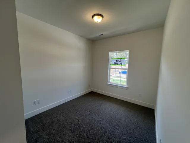 an empty room with a window