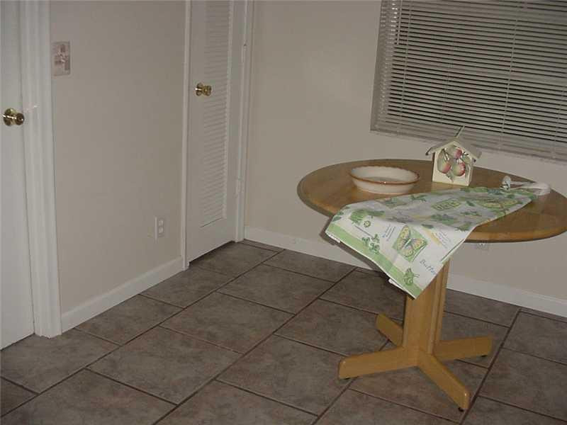 22729 Southwest 56th Avenue Boca Raton, FL 33433 - Photo 11 of 24 a bathroom with a sink and a mirror