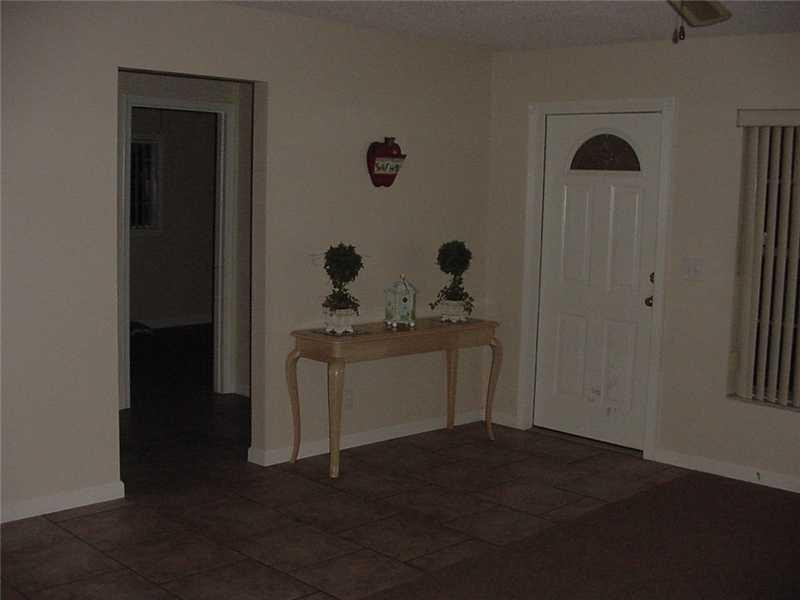 22729 Southwest 56th Avenue Boca Raton, FL 33433 - Photo 4 of 24 a utility room with dryer and washer