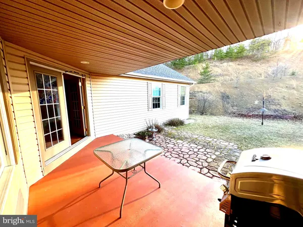 a backyard of a house with seating space