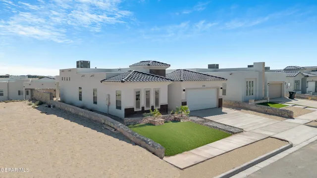 a aerial view of a house with garden