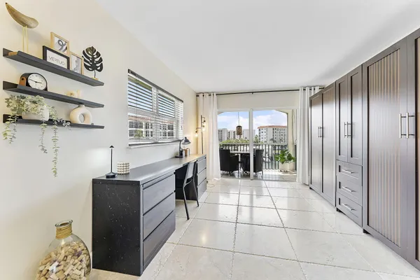 a kitchen with stainless steel appliances a refrigerator and a stove