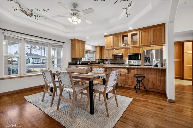 a view of a dining room with furniture window and outside view