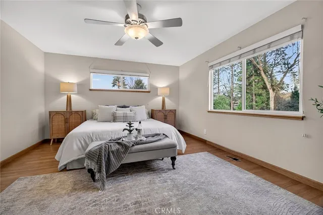a bathroom with a sink a light fixture and a mirror
