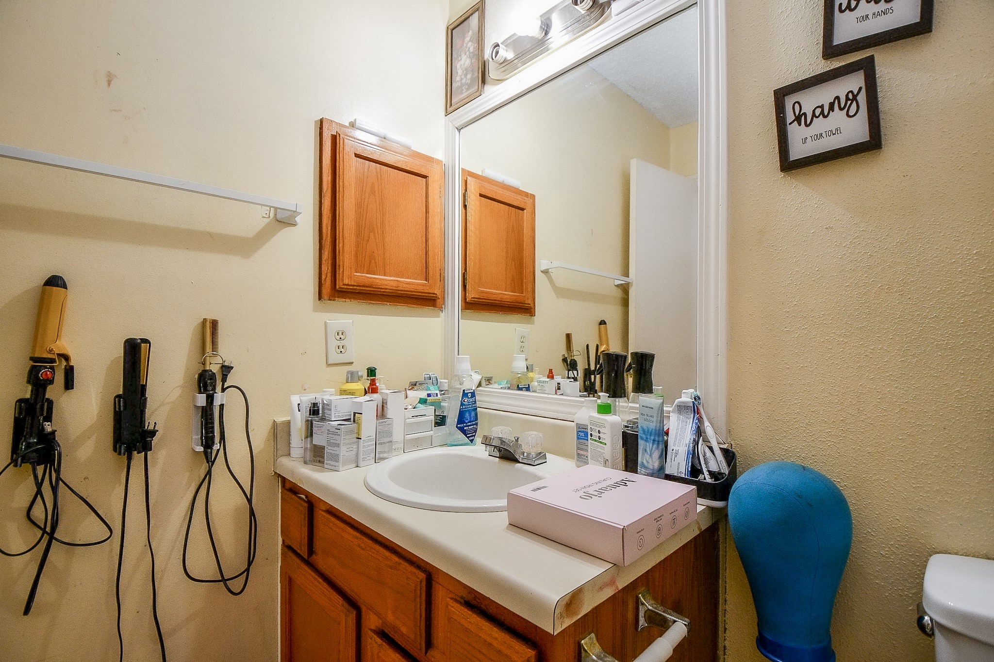 8628 Beechcrest Street Houston, TX 77083 - Photo 13 of 20 a view of a kitchen area with furniture and stove