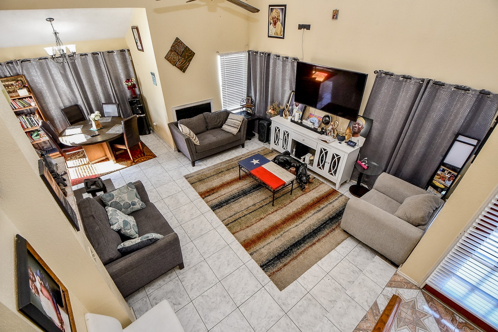 8628 Beechcrest Street Houston, TX 77083 - Photo 16 of 20 a living room with furniture and a flat screen tv