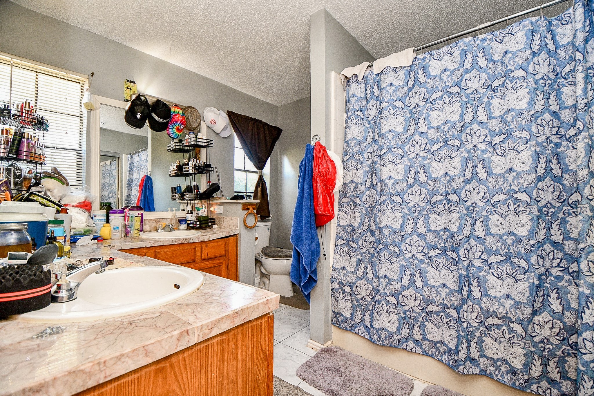 8628 Beechcrest Street Houston, TX 77083 - Photo 9 of 20 a view of a kitchen with utility and utility