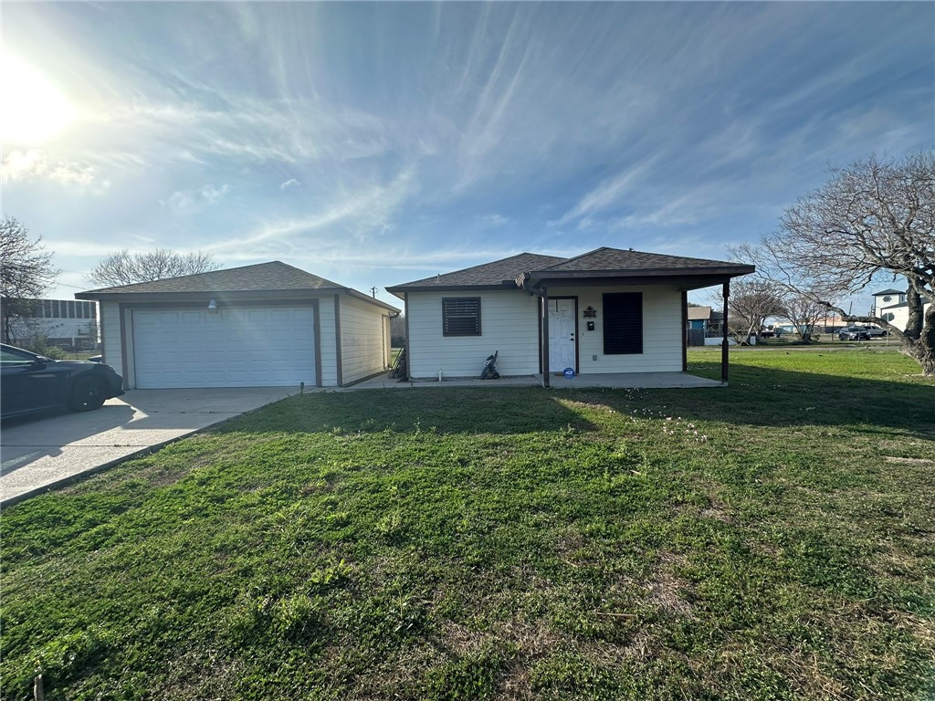 357 Houston Street Portland, TX 78374 - Photo 1 of 1 a front view of a house with garden