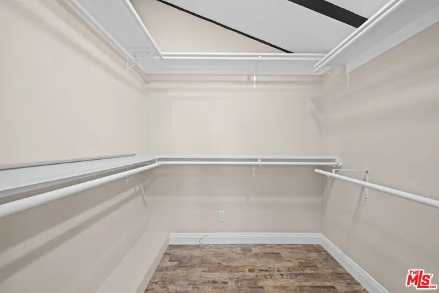 a view of an empty walk in closet