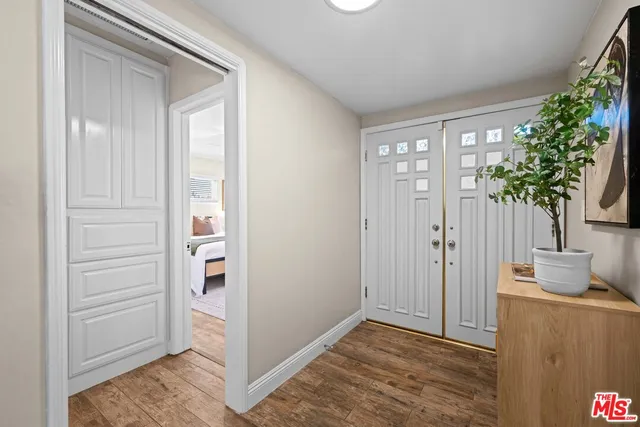 a living room with a couch and a window