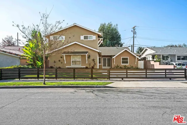 a street sign on the side of a building