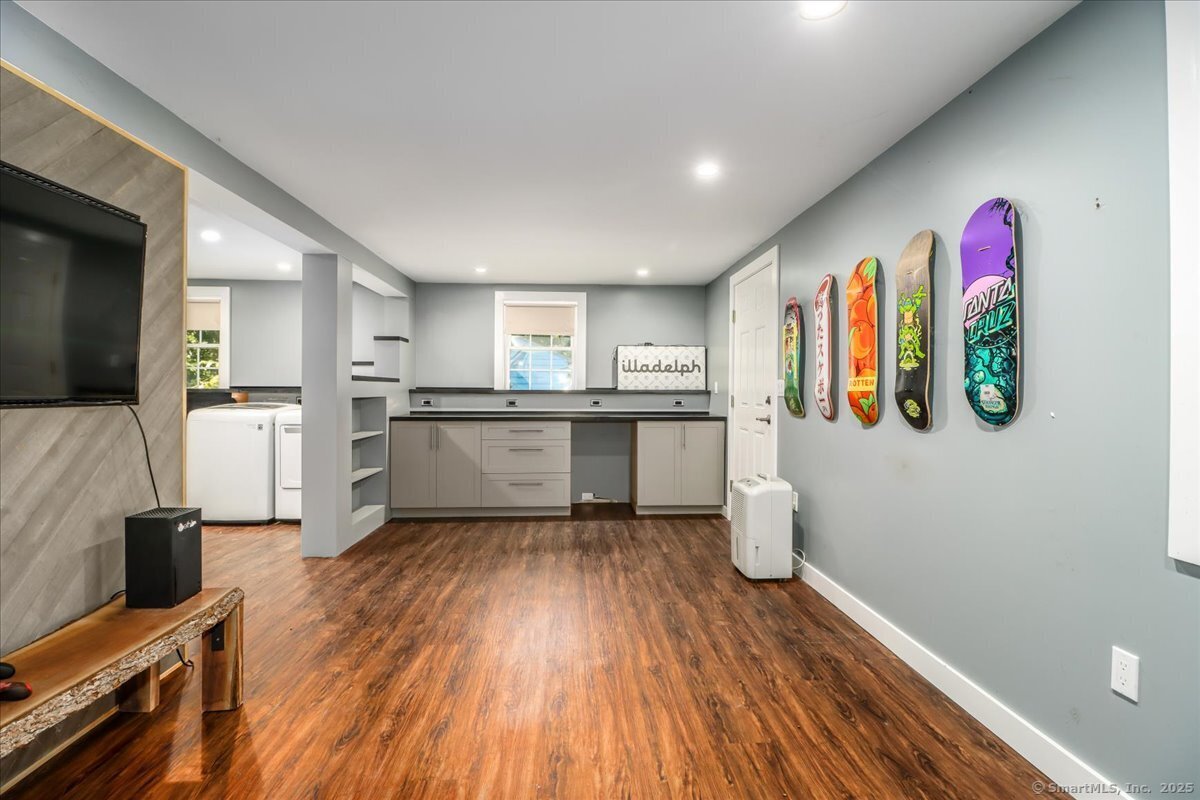 35 Hillendale Drive New Milford, CT 06776 - Photo 32 of 39 a kitchen with stainless steel appliances granite countertop a stove top oven a sink and a refrigerator