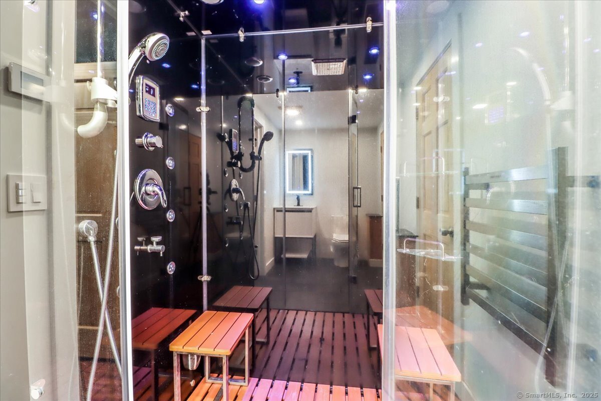 35 Hillendale Drive New Milford, CT 06776 - Photo 38 of 39 a bathroom with a glass shower door