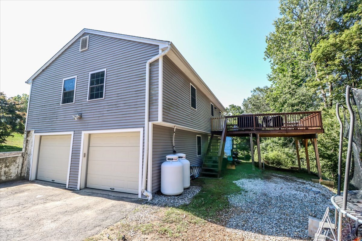 35 Hillendale Drive New Milford, CT 06776 - Photo 39 of 39 a front view of a house with garden